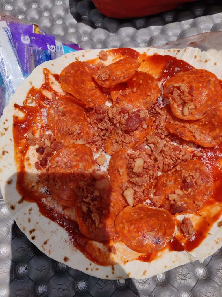 Trail pizza- tortilla bread with peperoni